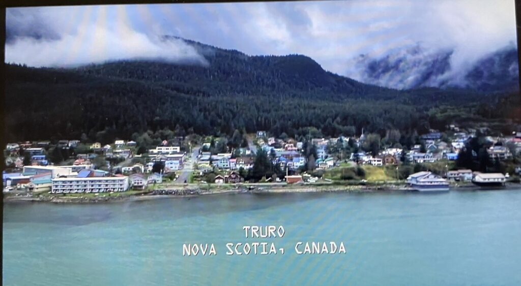 Certainly not Truro, Nova Scotia, Canada - some coastal town with tropical looking mountains in the background. 