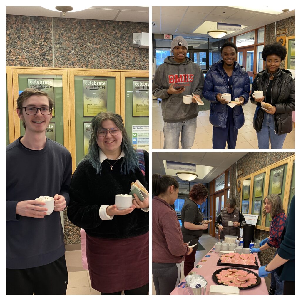Students with hot chocolate and heart shaped cookies (with pink icing) being served by staff. 