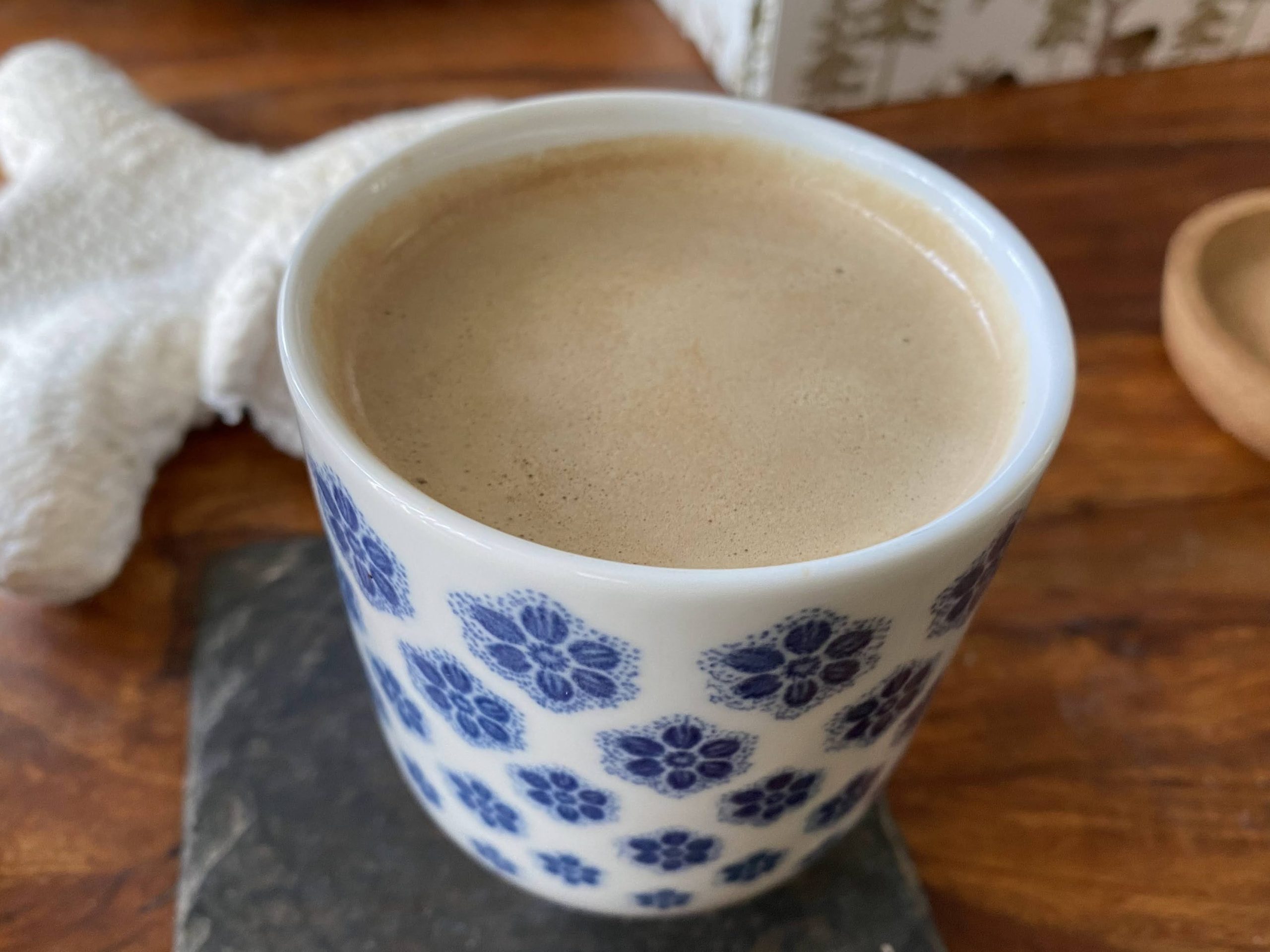 Oatmilk latte in a china Ikea cup