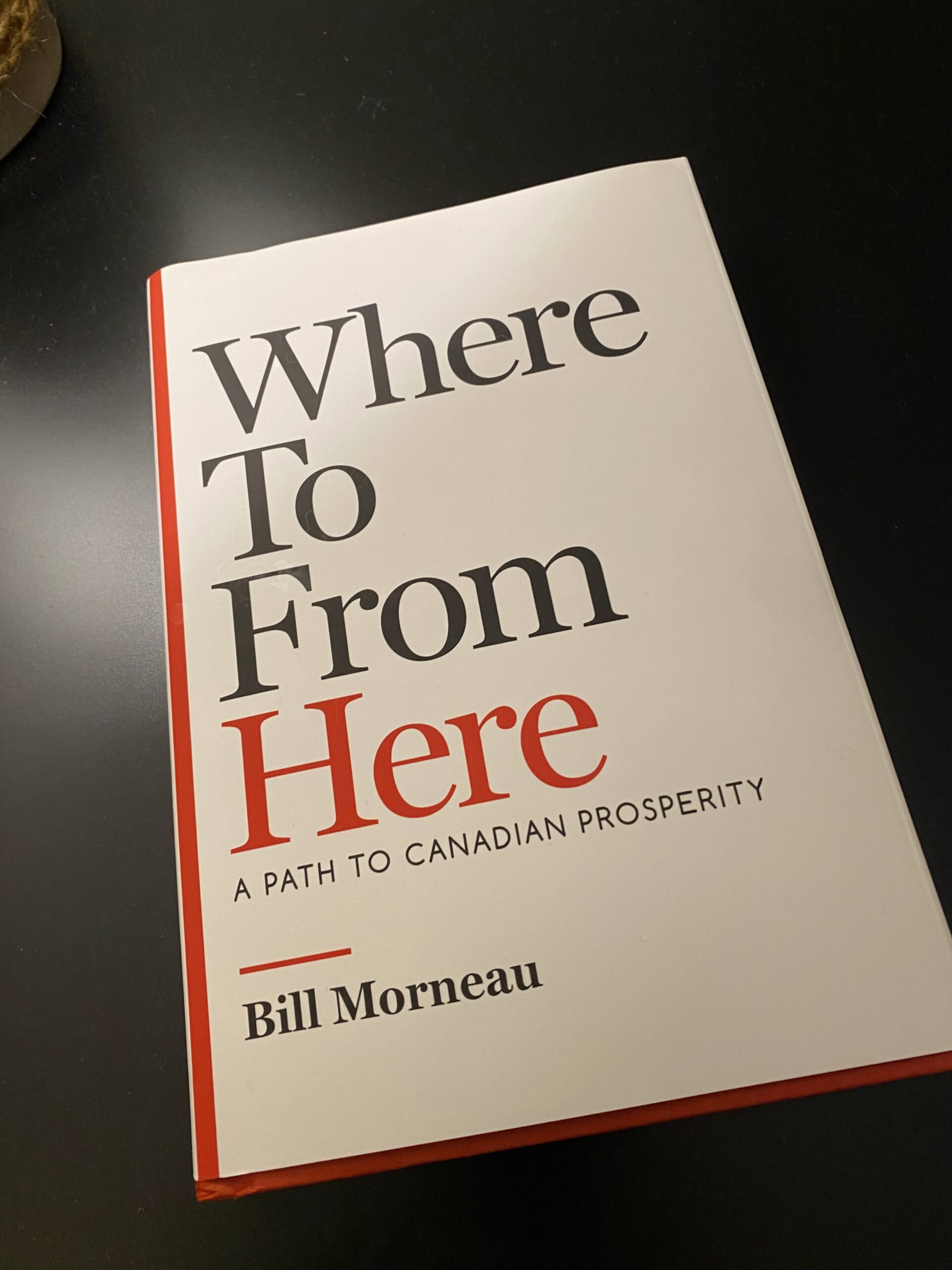 Where to from here by Bill Morneau book on a coffee table. 